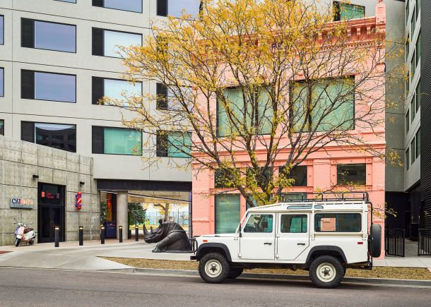 Catbird Hotel exterior with rhino sculpture